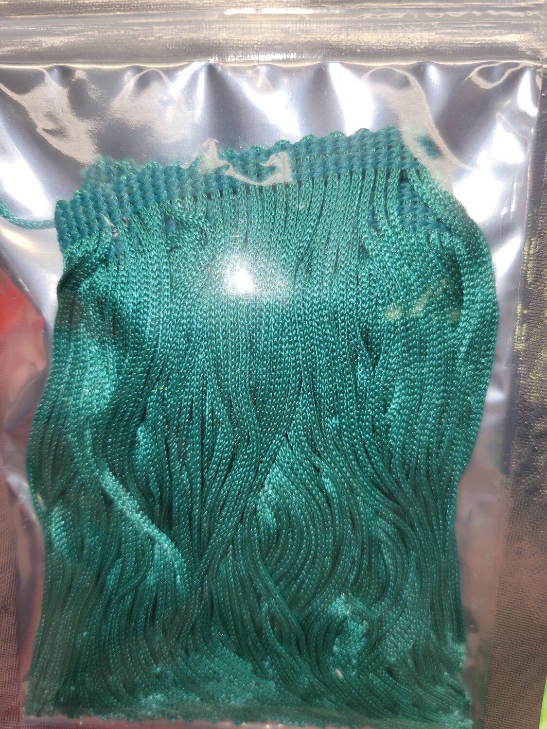 teal fringe 1 yd