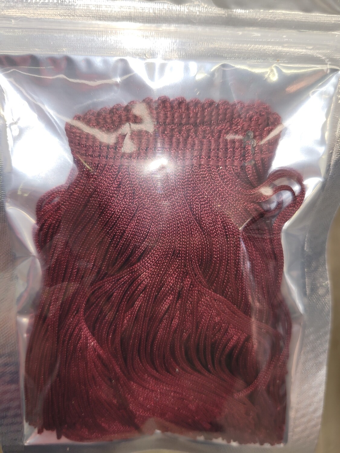 Maroon fringe 1yd