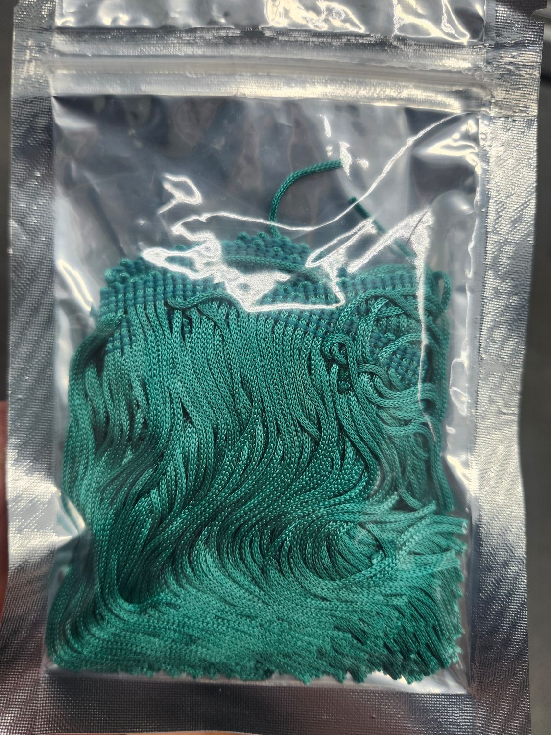 Dark green fringe 1 yd