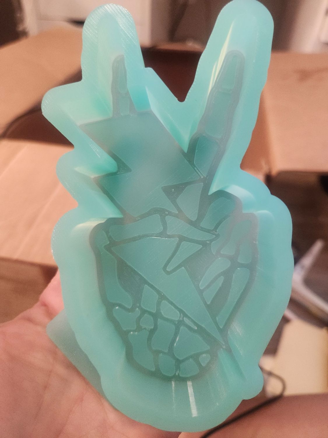 Skeleton hand with peace sign