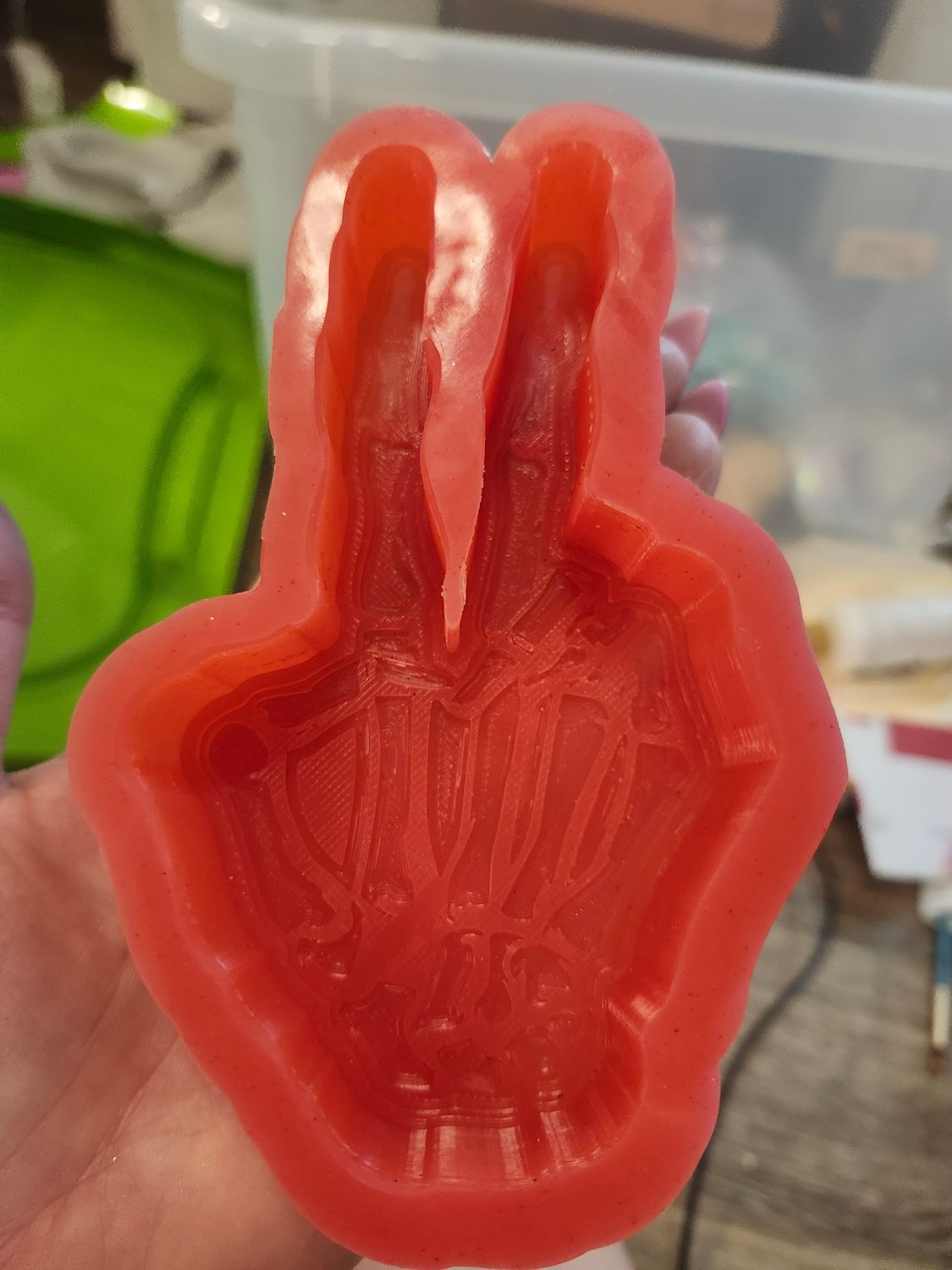 Skeleton hand peace sign