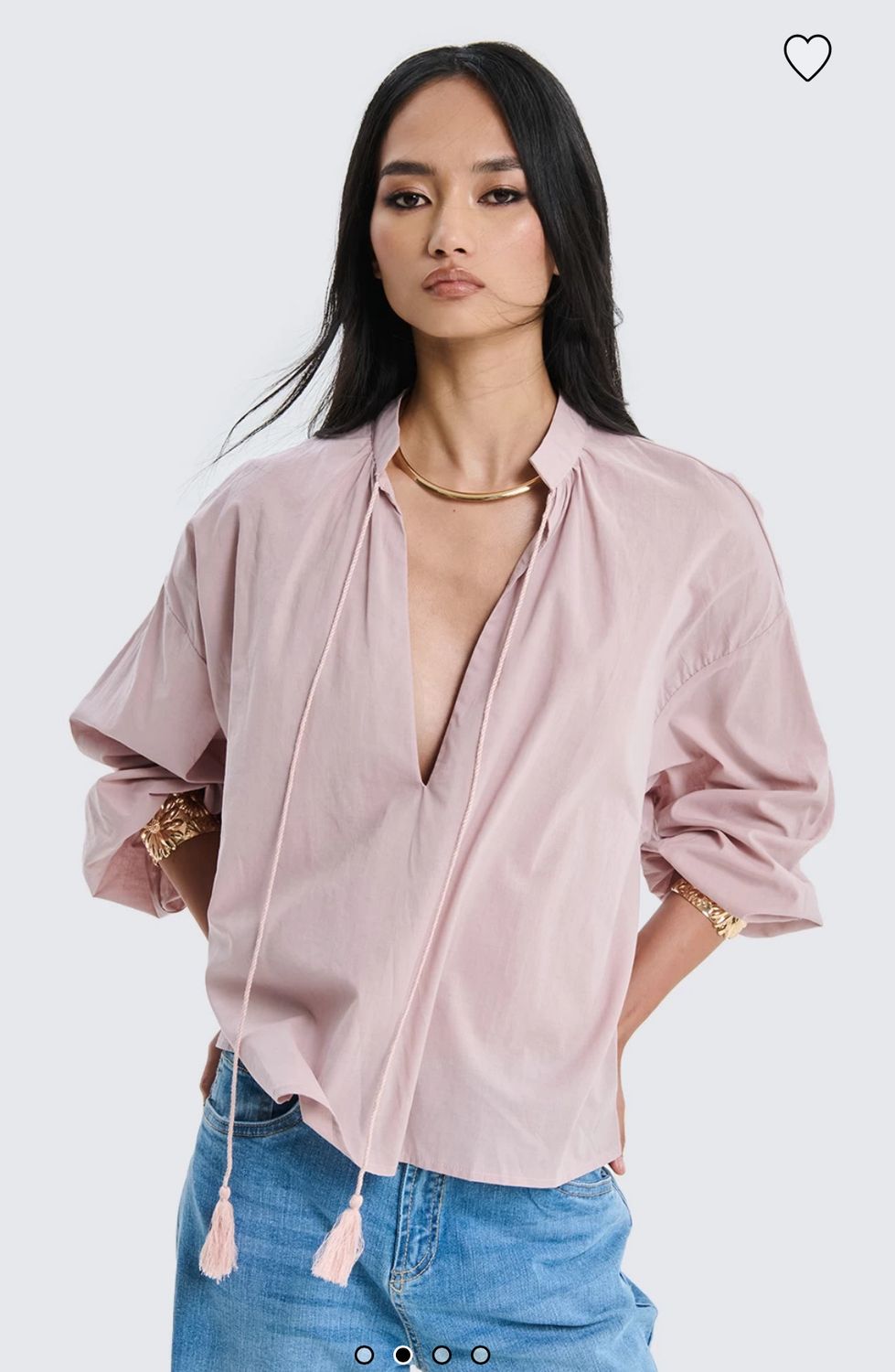 Blusa con nappine
