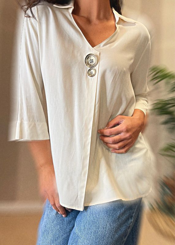Blusa ampia