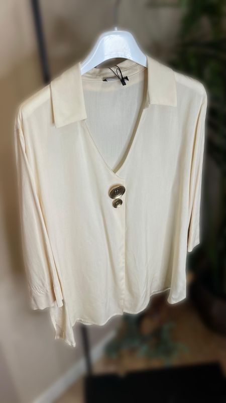 Blusa ampia