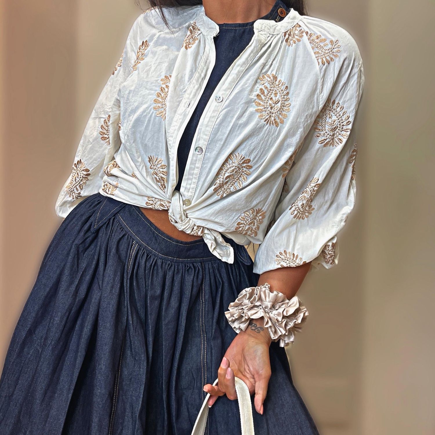 Blusa ampia