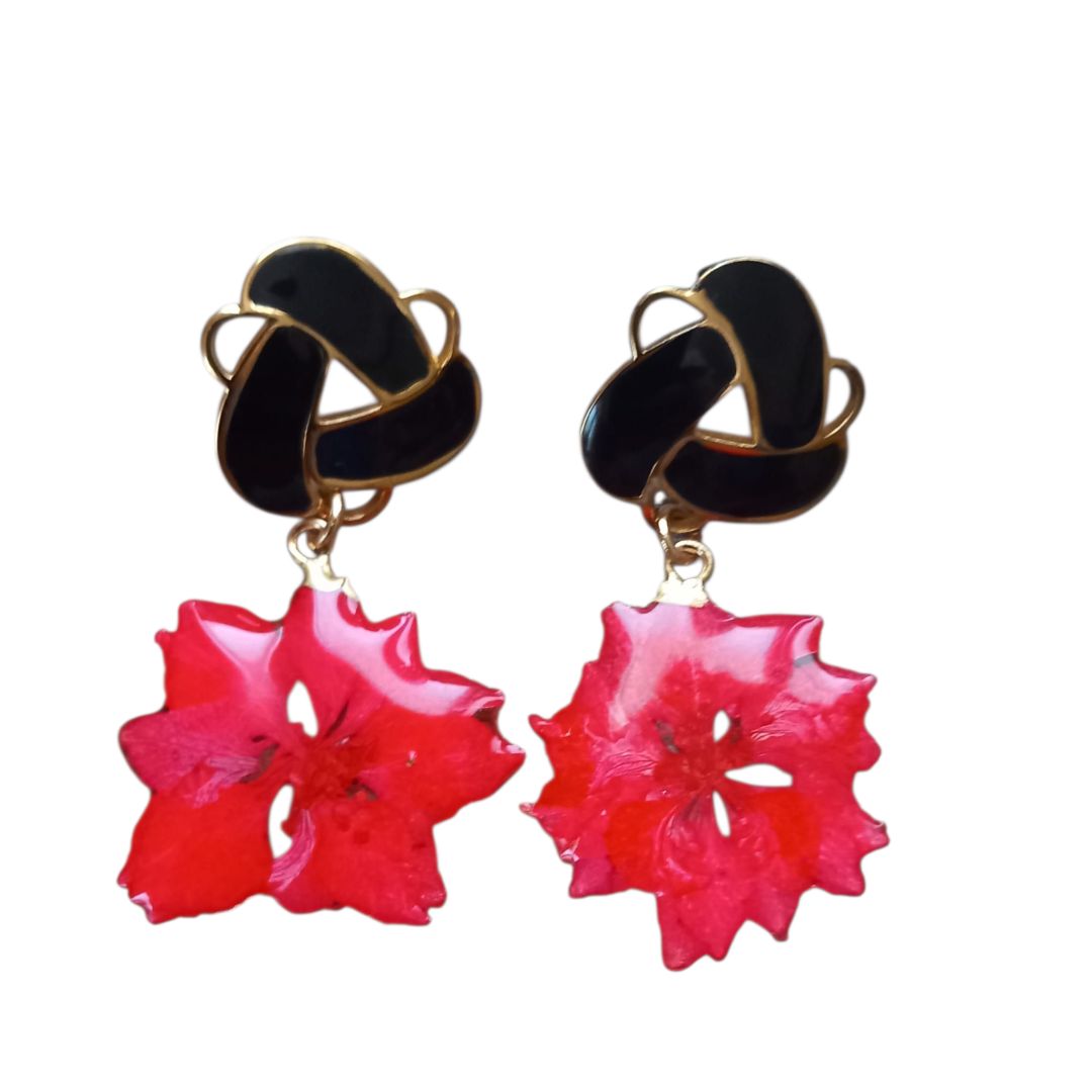 Iris rosso e supporto smaltato nero