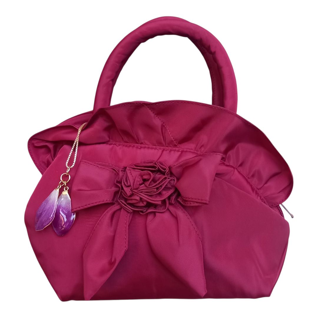 Borsetta mignon con petali orchidea