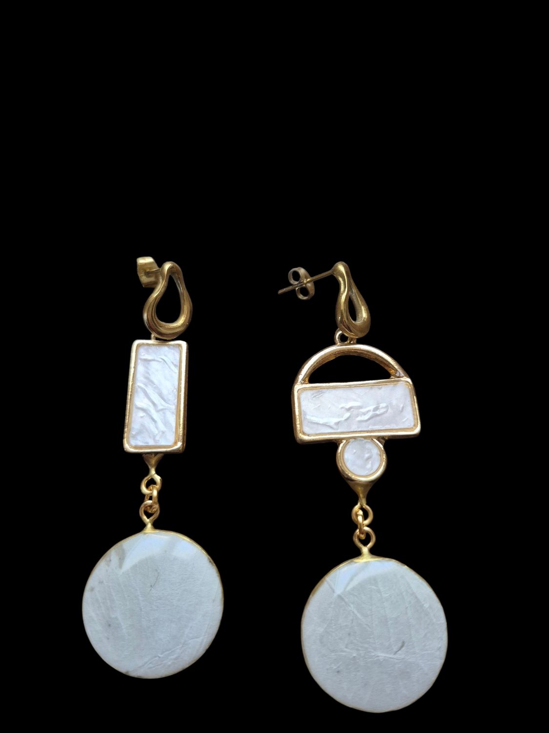 Petalino rosa bianca rotondo e montatura geometrica