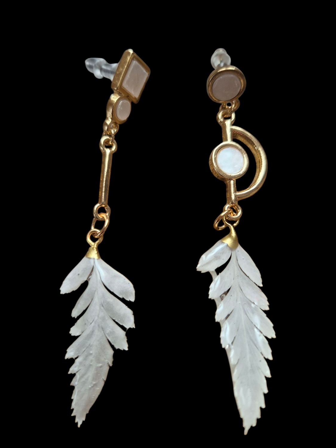 Felce bianca e montatura geometrica