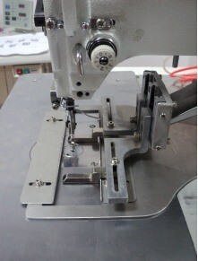 Webbing Clamp for Programmable Sewing Machine
