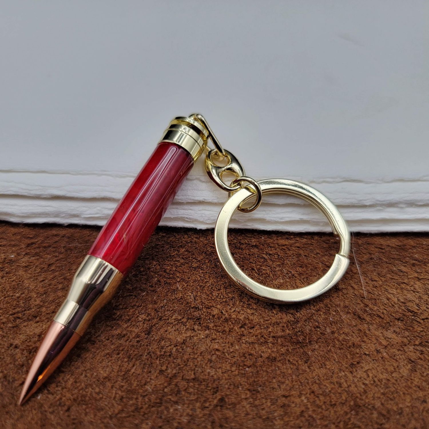 Red Bullet Key Chain with Gold Finish