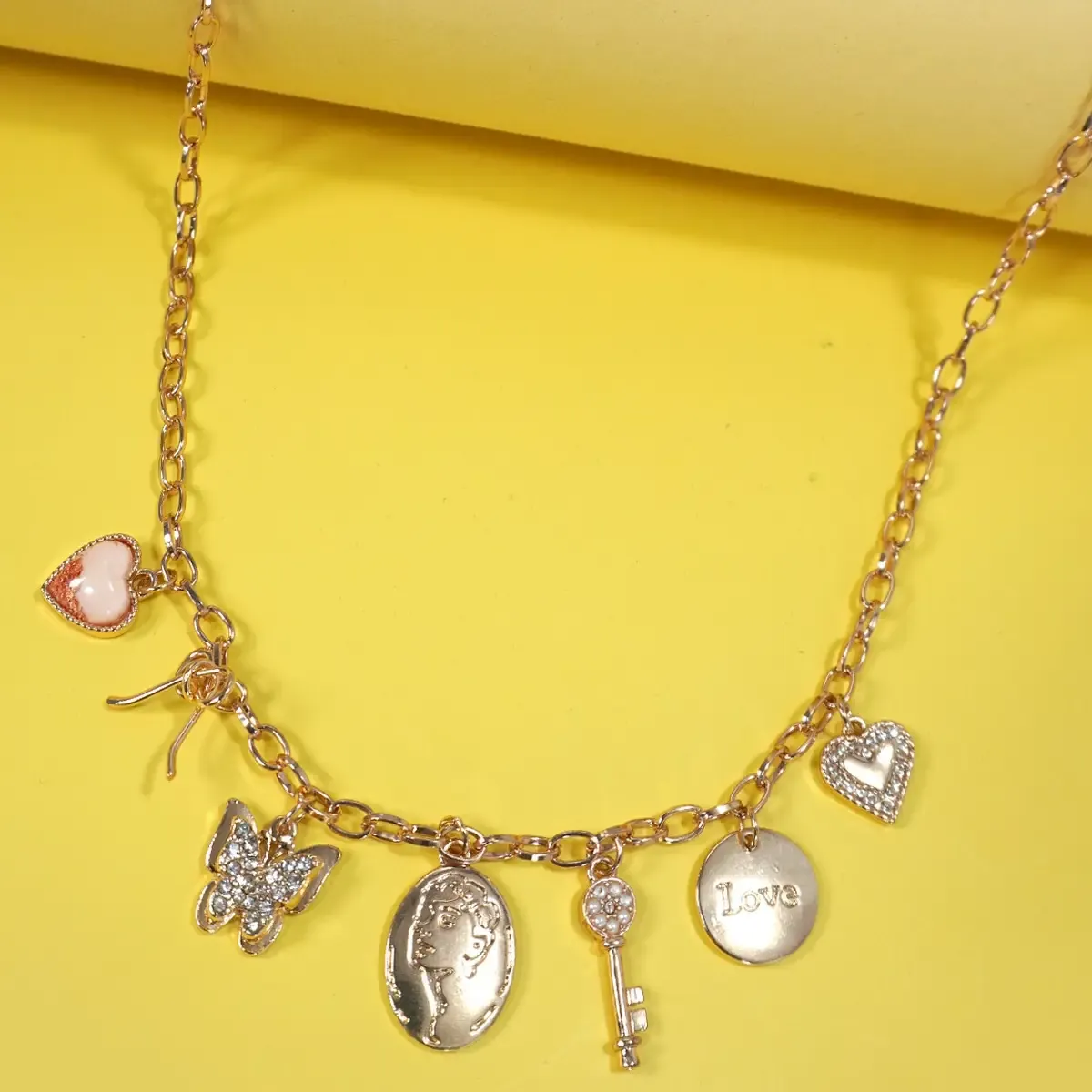 Gold Charm Bow &amp; Butterfly Necklace