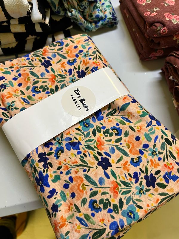 Siniset Kukat - puuvillaelastaanitrikoo, Persikka 1,2m Siniset Kukat - puuvillaelastaanitrikoo, Persikka 1,2m