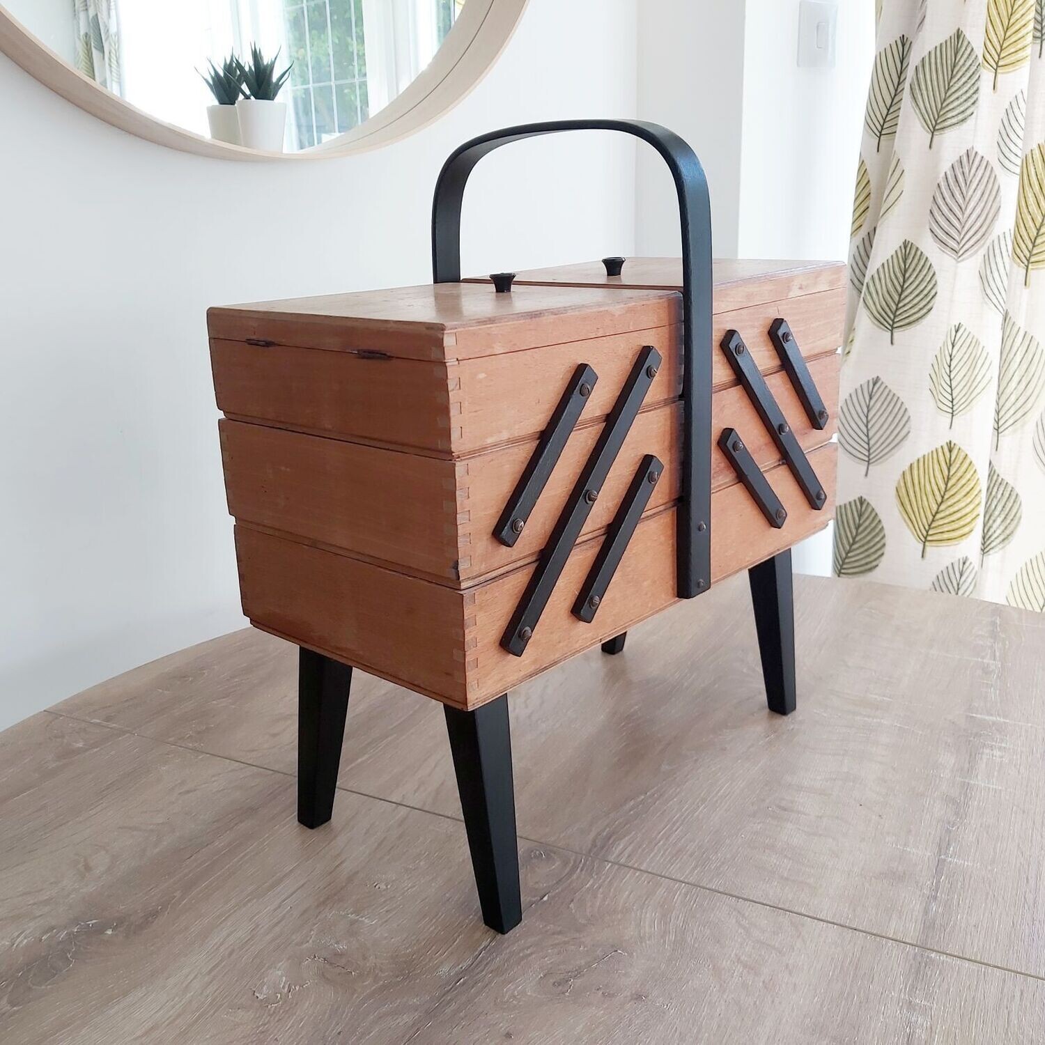 Vintage wooden sewing box with legs