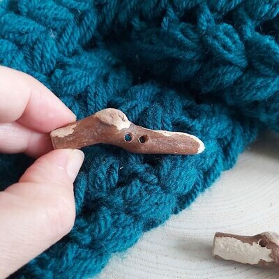 Pair of dog leg toggle style driftwood buttons