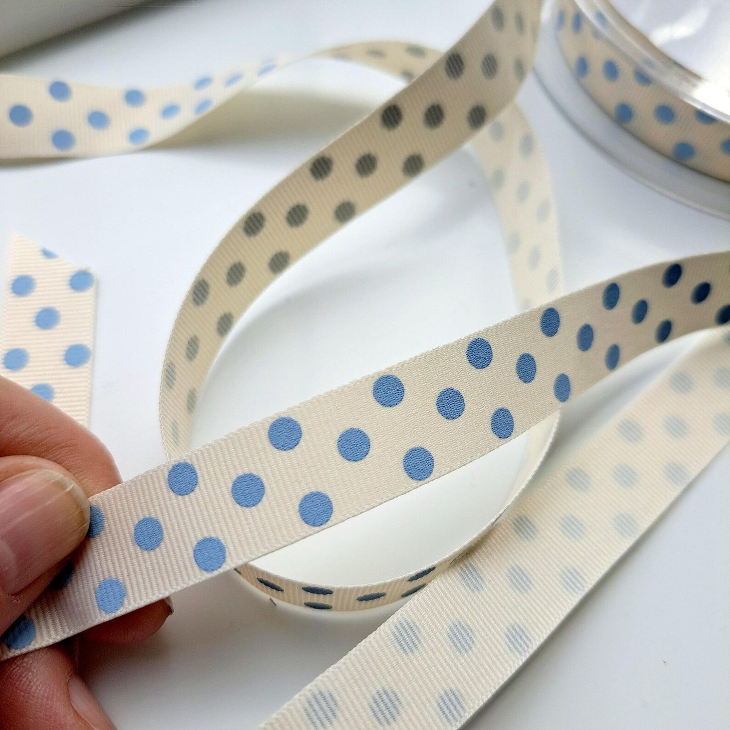 White with blue spots ribbon