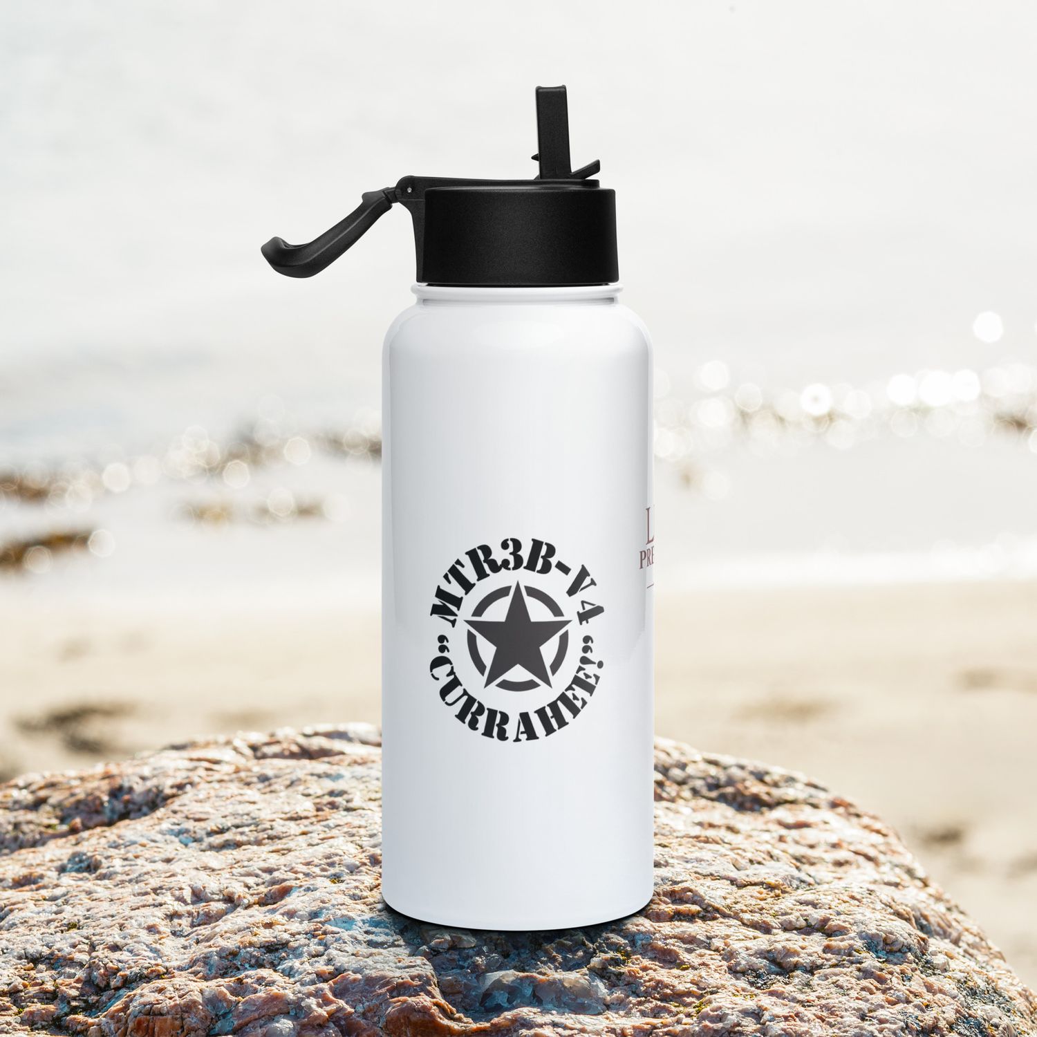Stainless steel water bottle with a straw lid