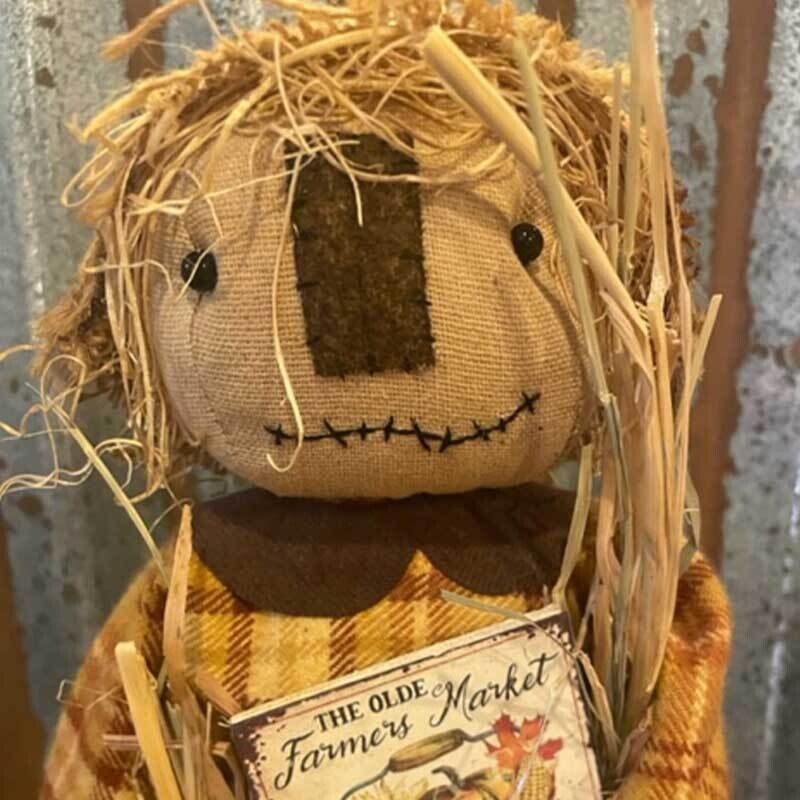 Scarecrow with Market Sign