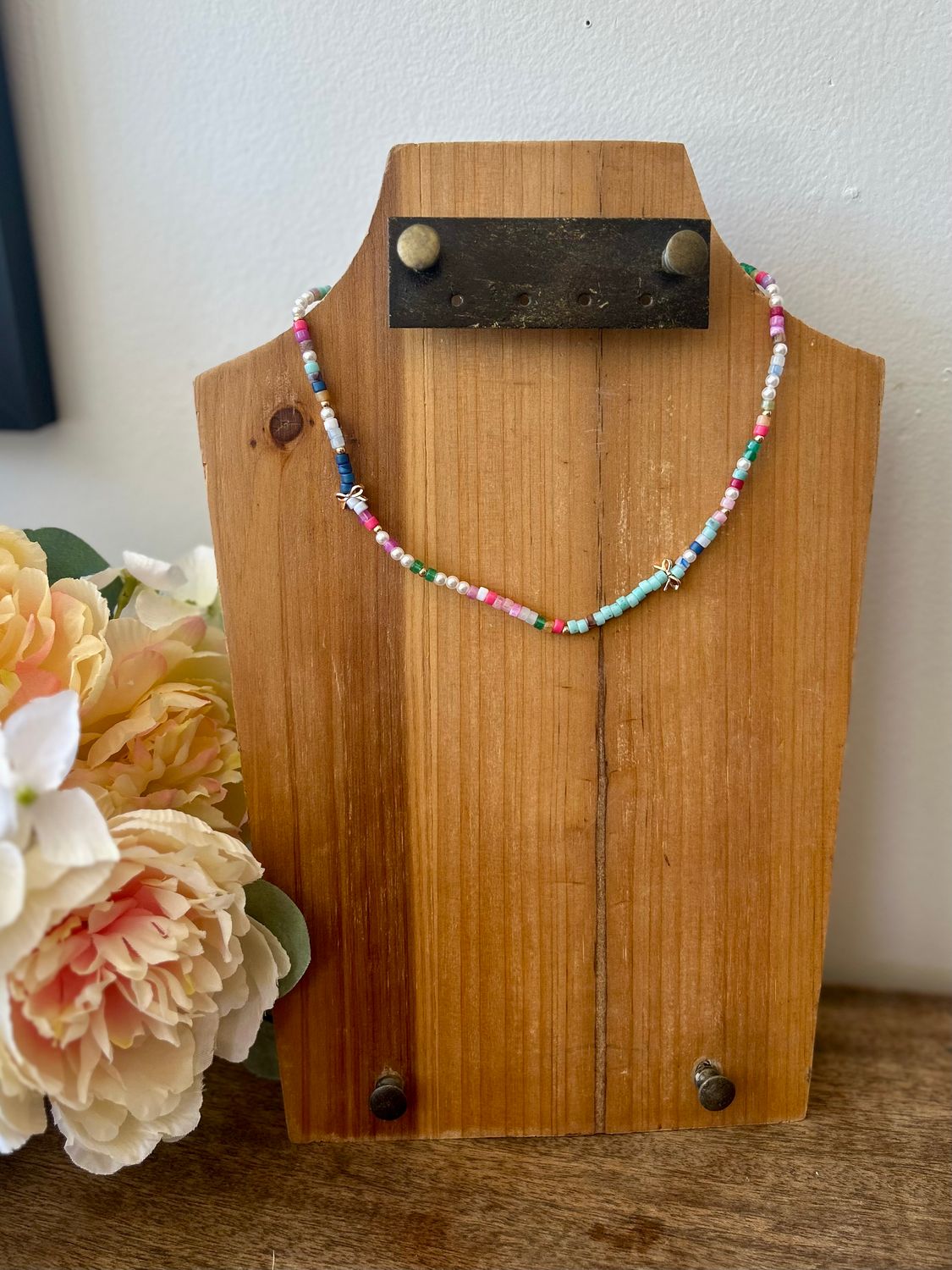 Multi-Color Beaded Necklace with Bow and Pearl Details Multi-Color Beaded Necklace with Bow and Pearl Details