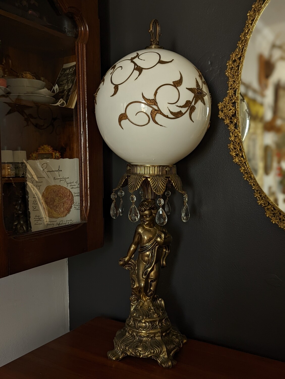 Cherub globe lamp