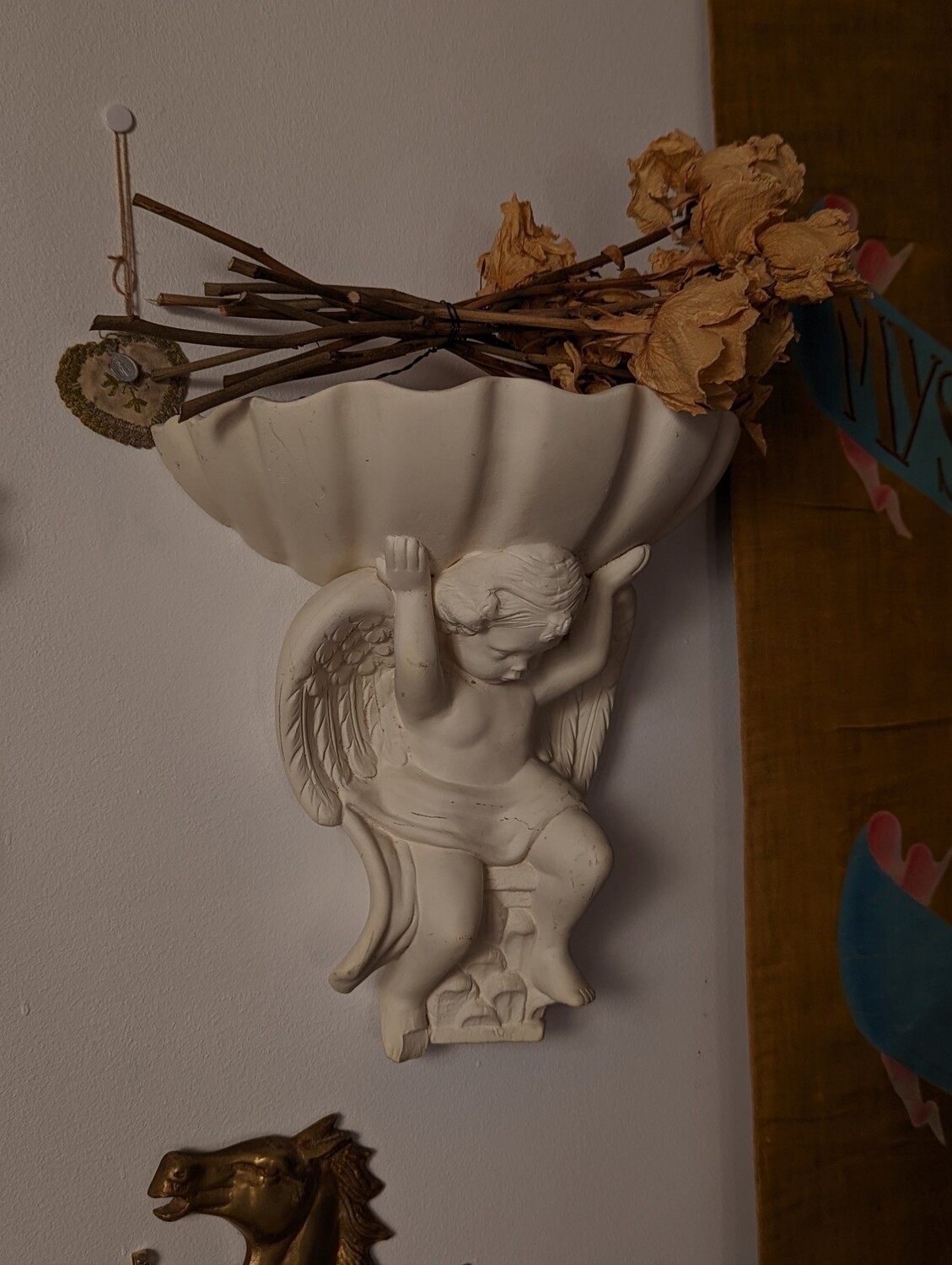cherub wall vase