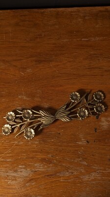 Brass floral belt buckle