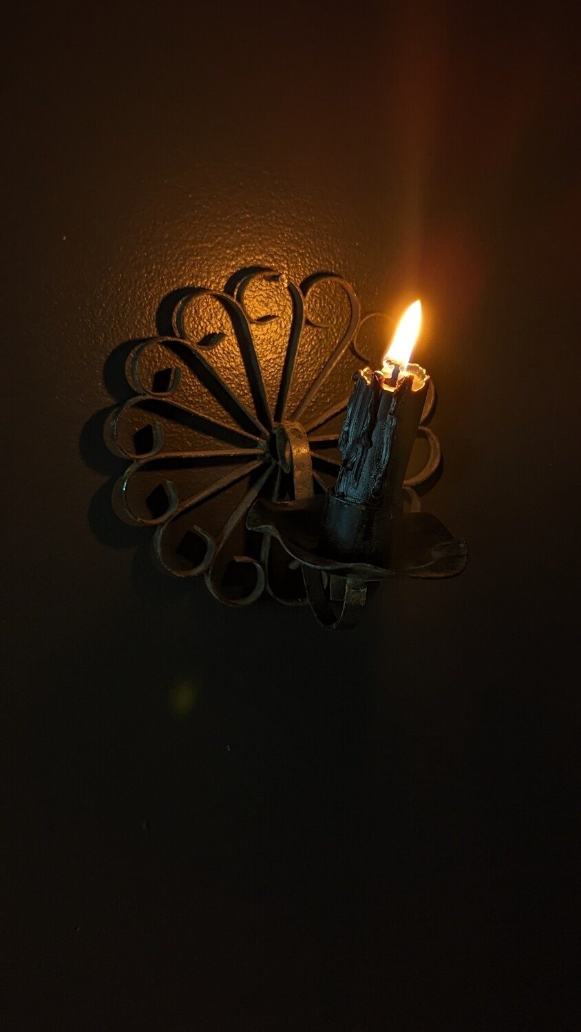 Metal floral candle holder