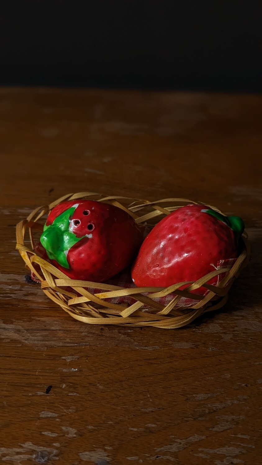Strawberries in basket salt and pepper shakers