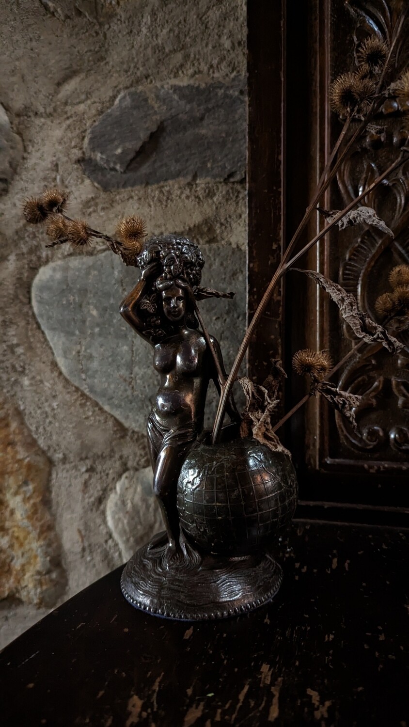 Woman with earth vase