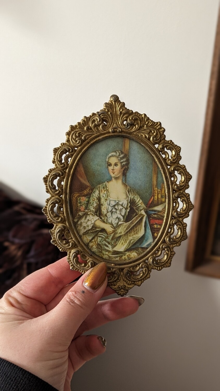 Small ornate frame lady