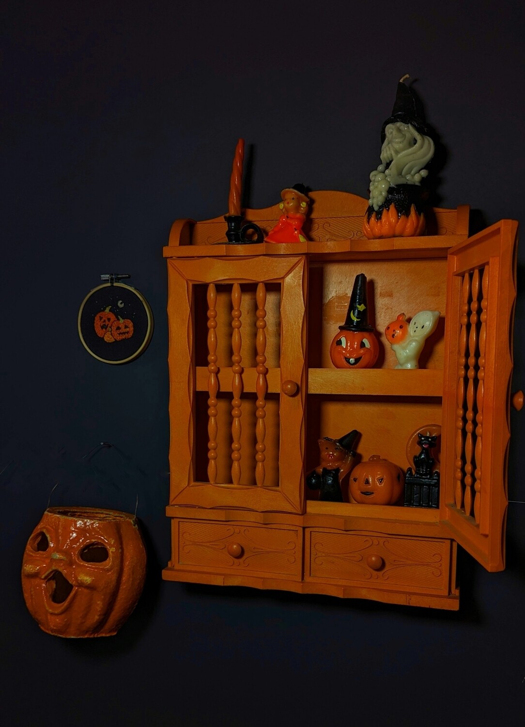 Halloween orange curio shelf