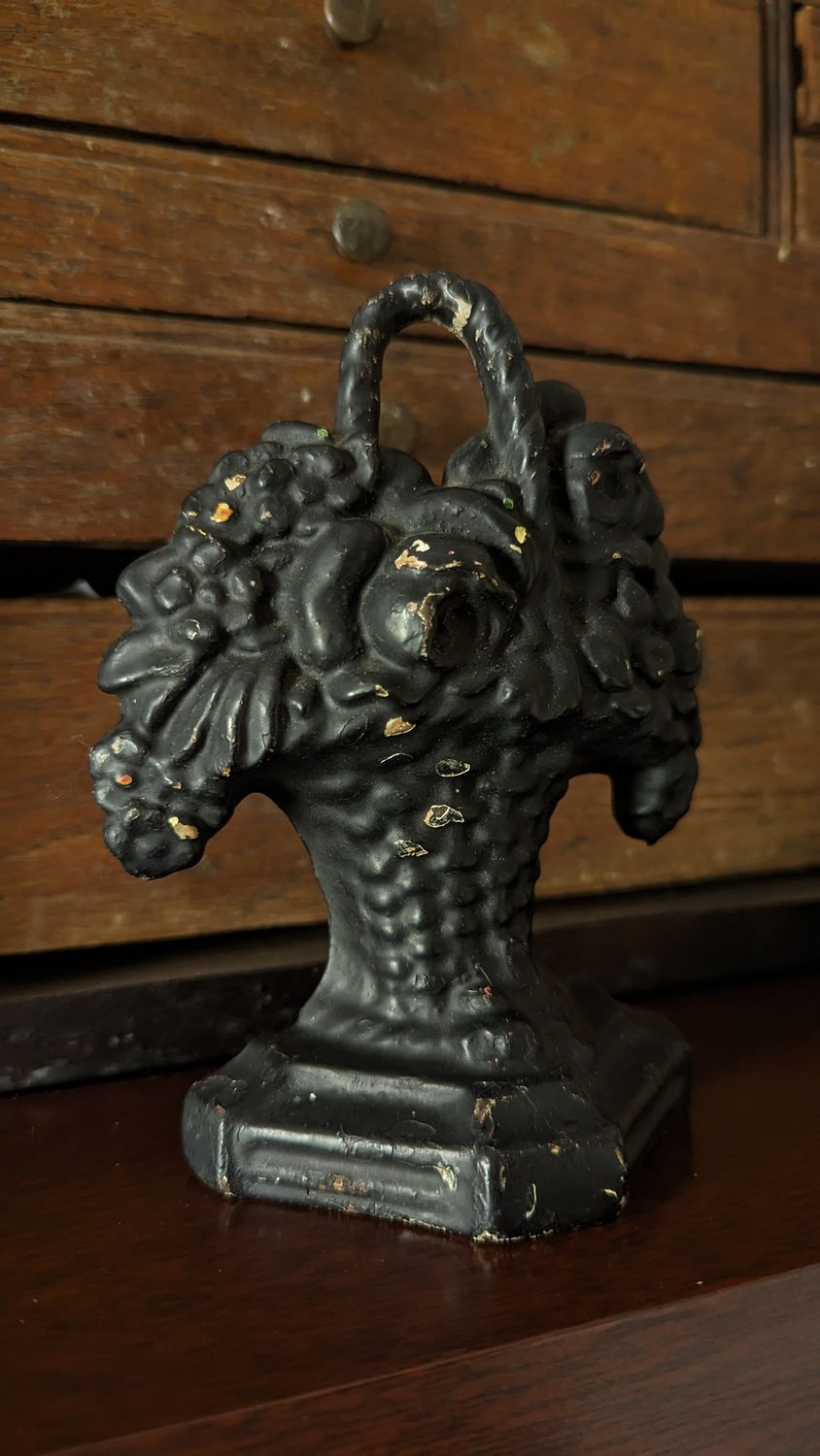 Flower basket door stopper