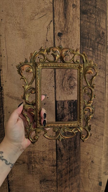 Ornate brass frame