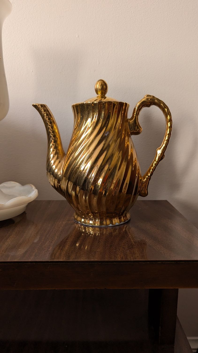 Golden tea pot