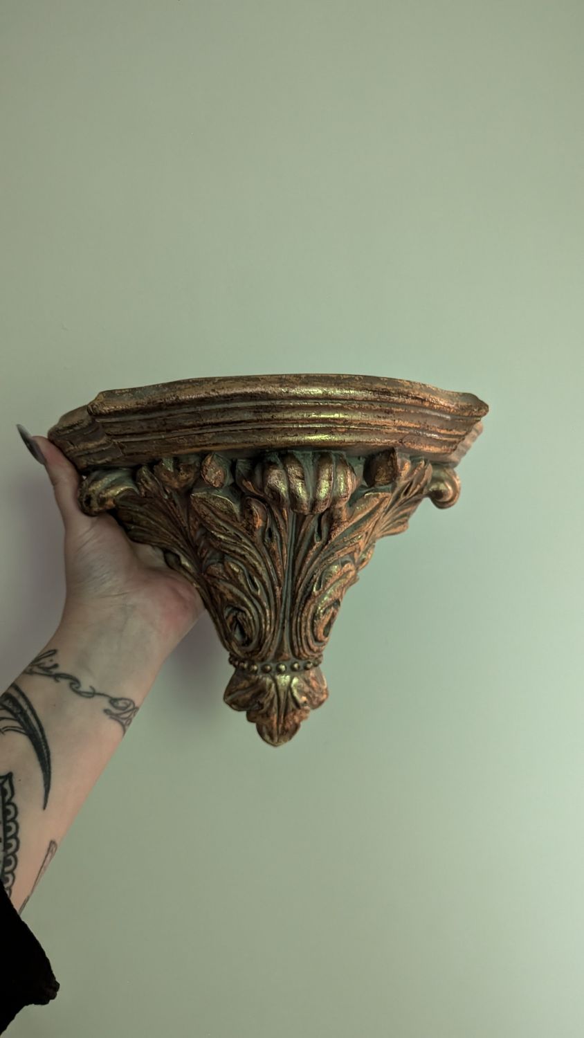 Gold ornate shelf