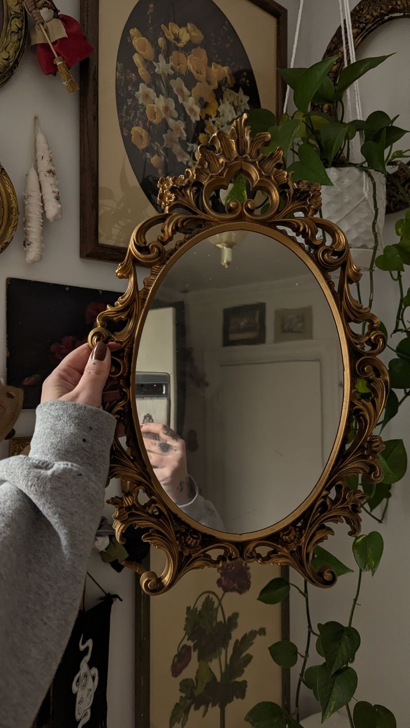 Small ornate plastic mirror
