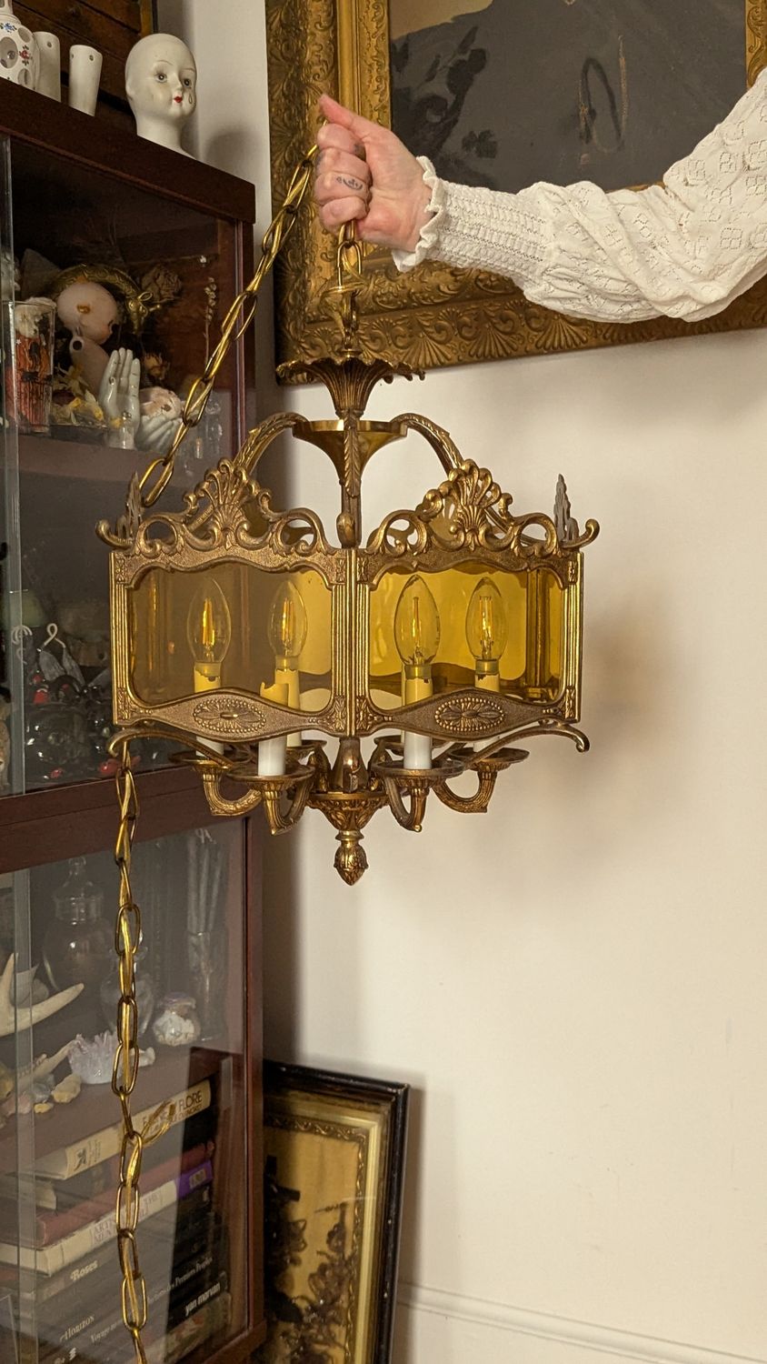 Brass swag lamps with amber glass