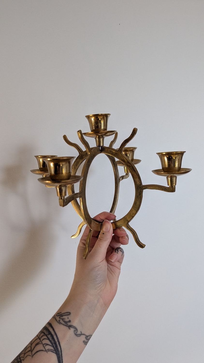 Brass sun abstract candelabra