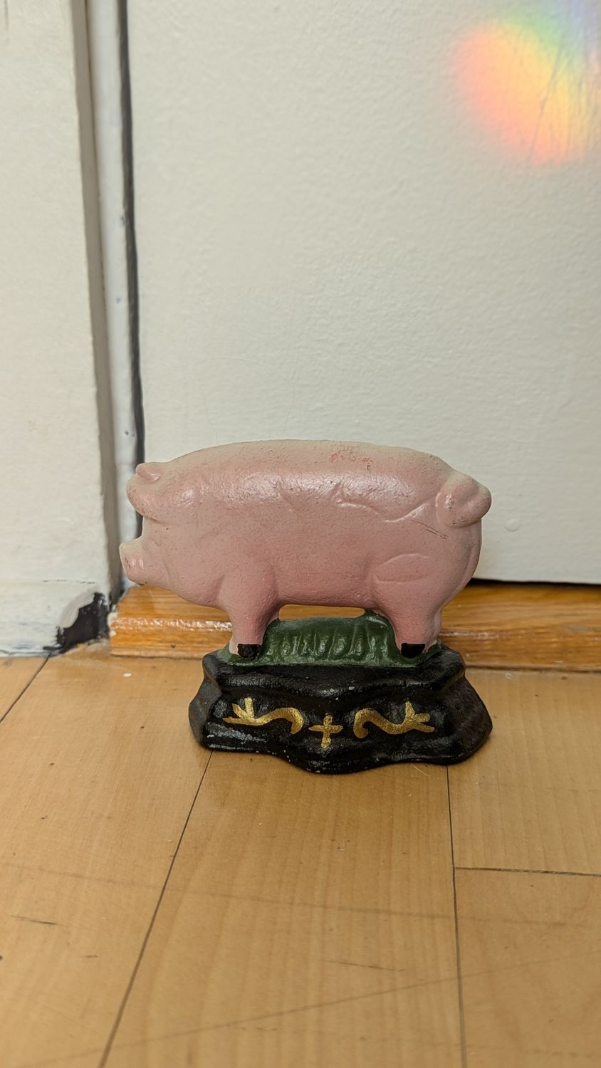 Piggy iron door stopper