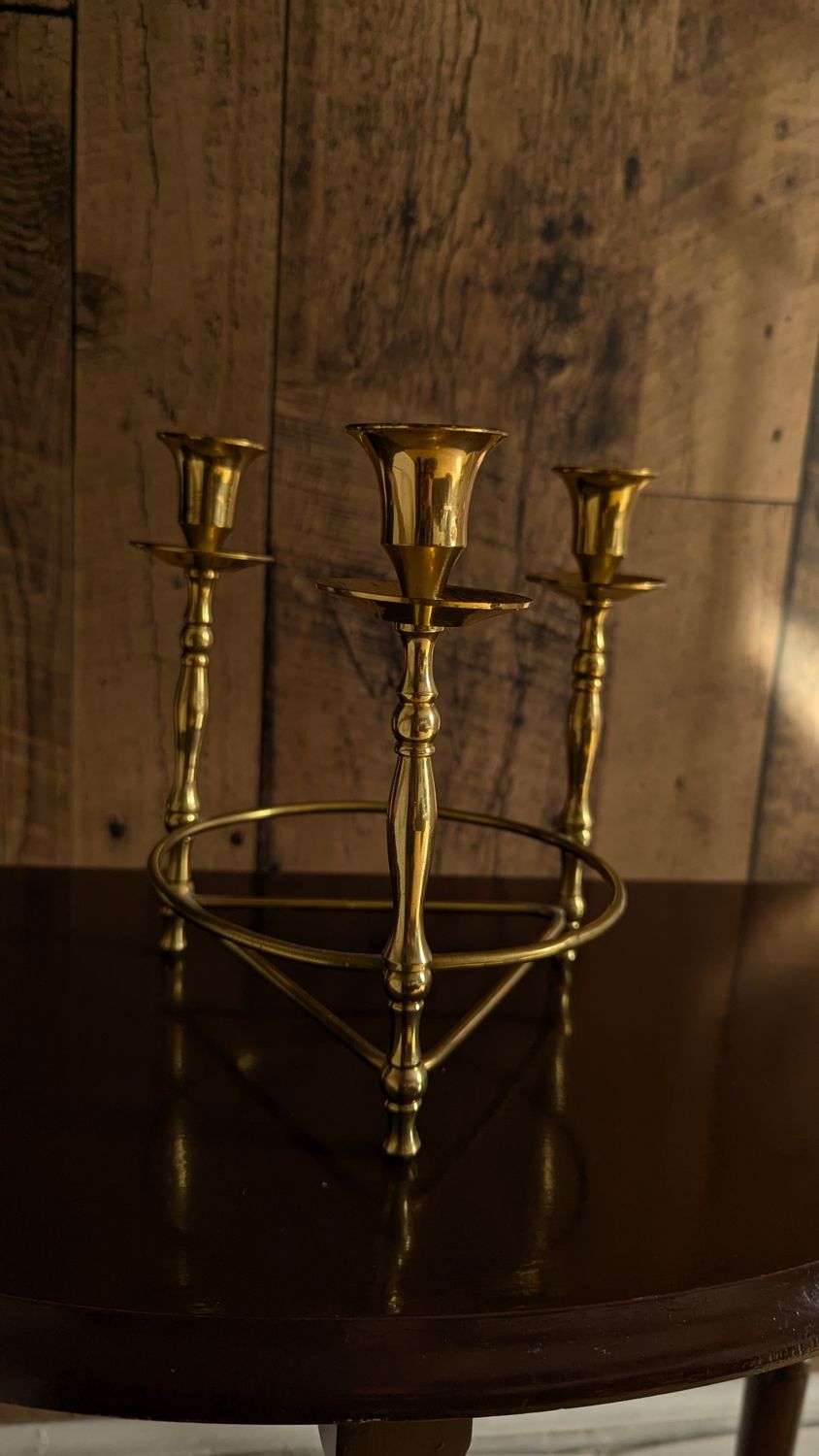 Triple brass candle holder