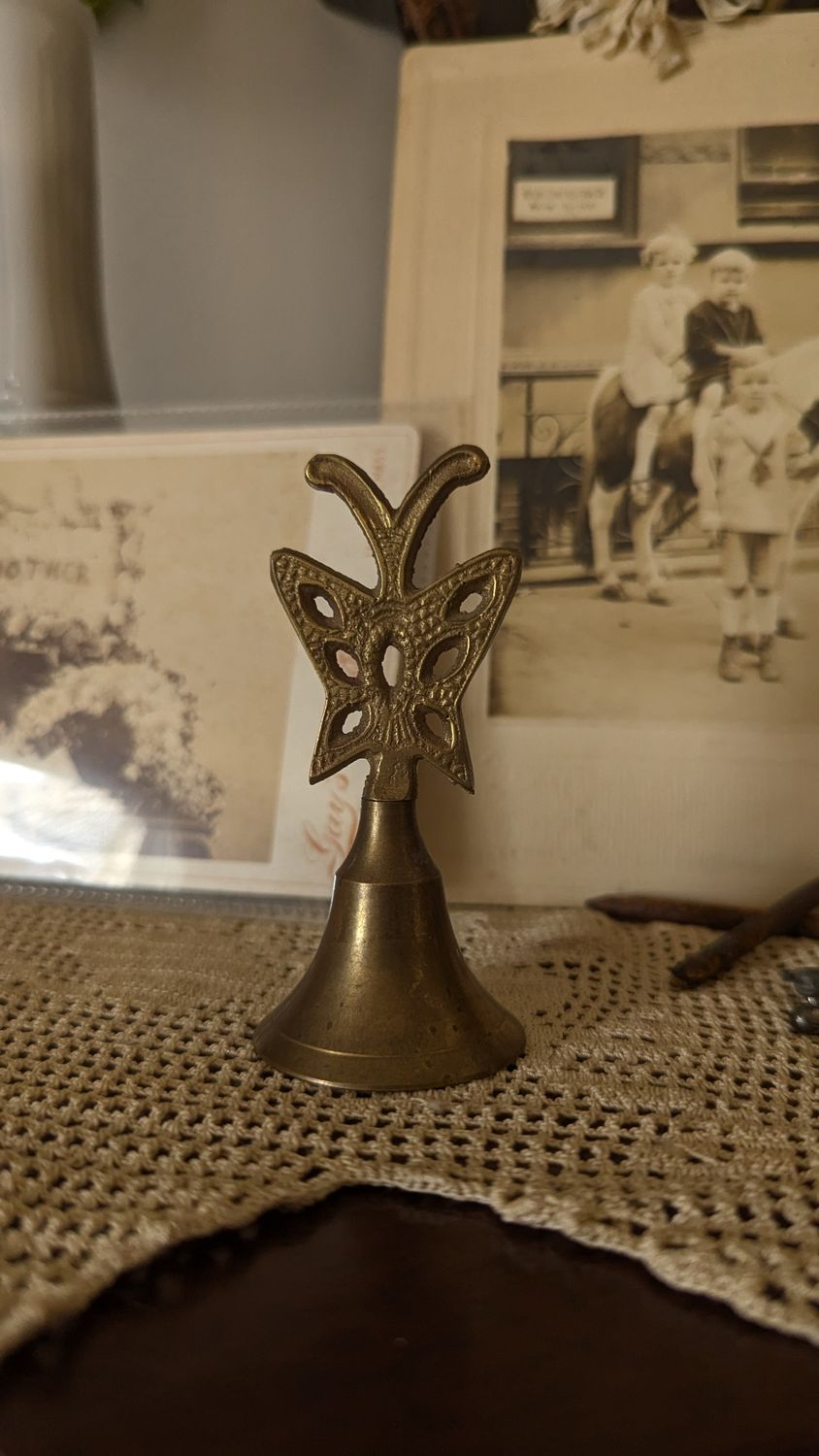 Butterfly brass bell