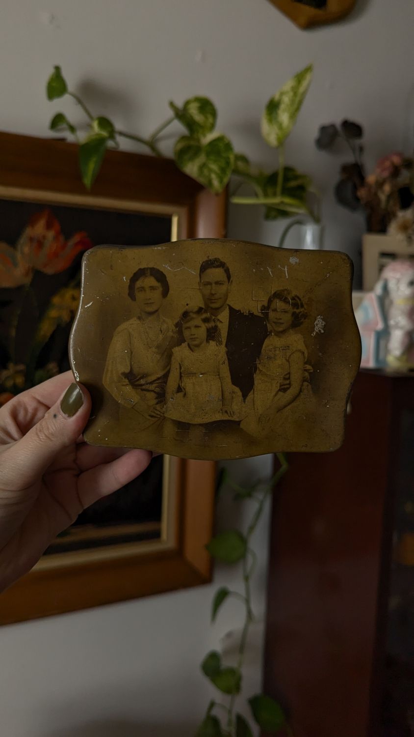Tin box with family portrait