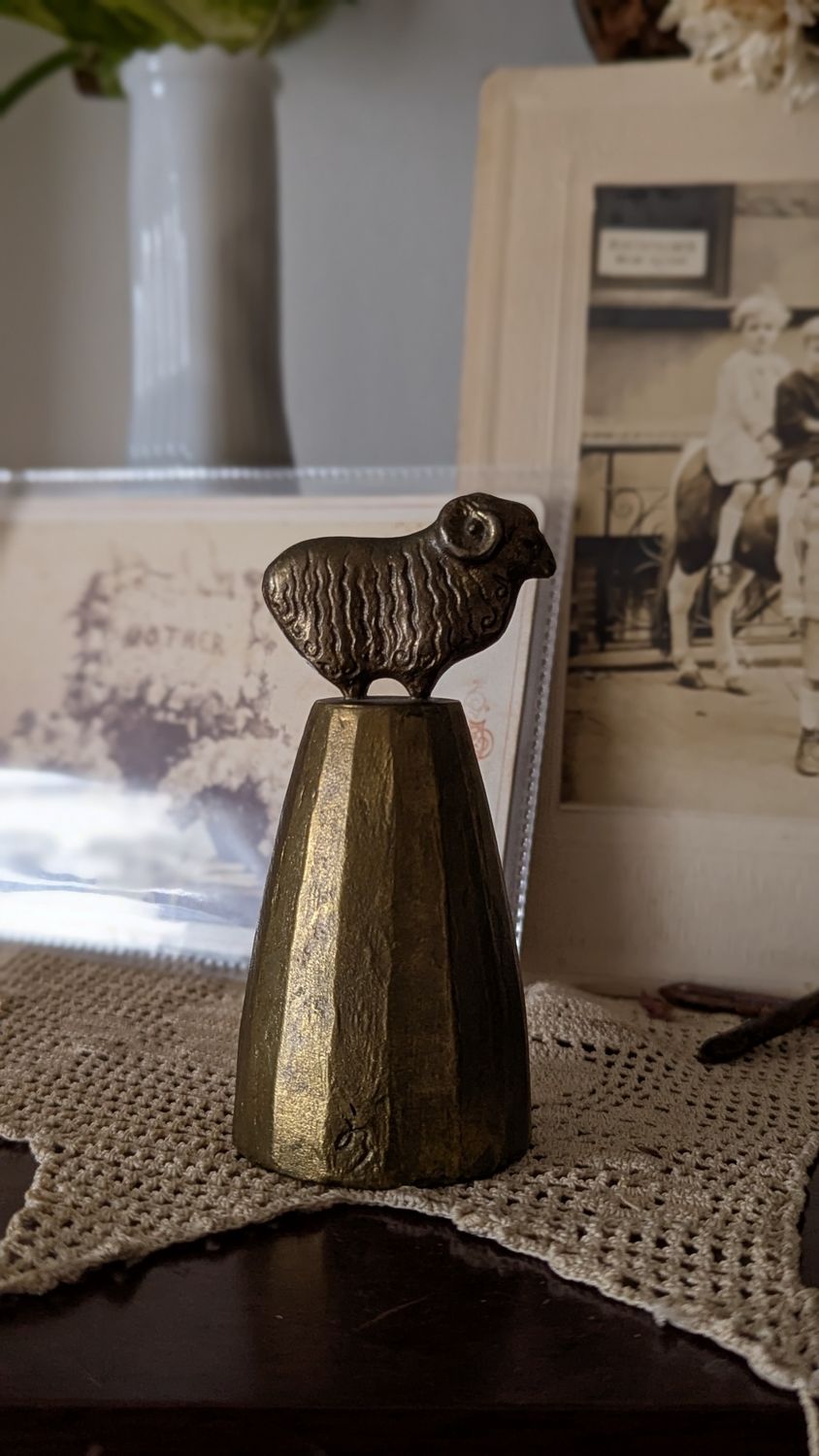 Ram brass bell