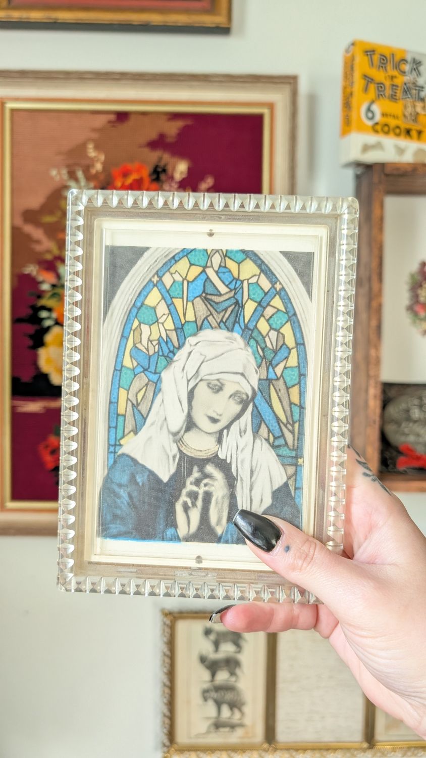 Virgin mary  changing hologram