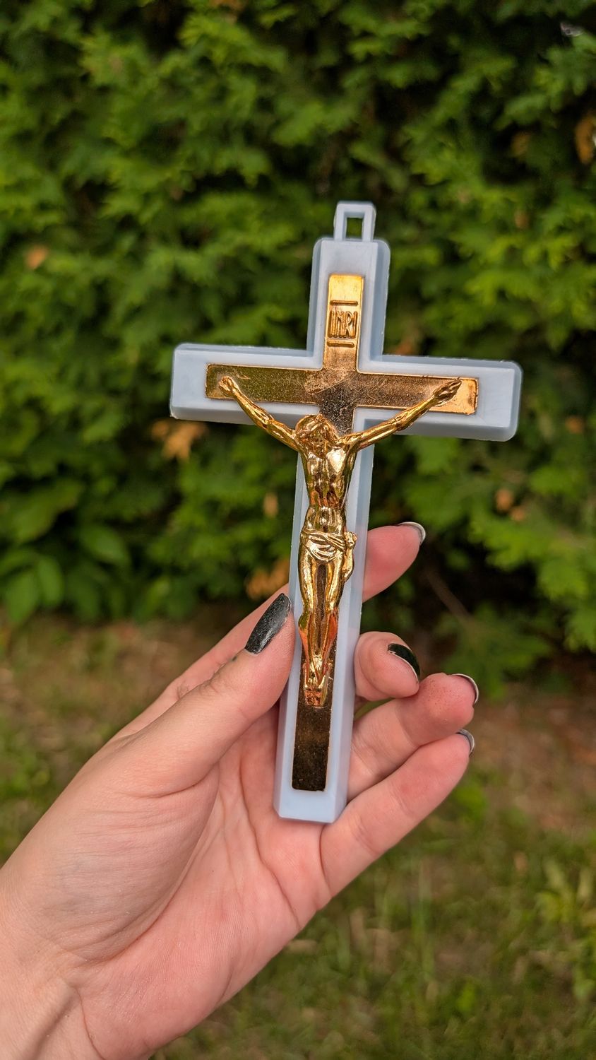 Blue plastic crucifix