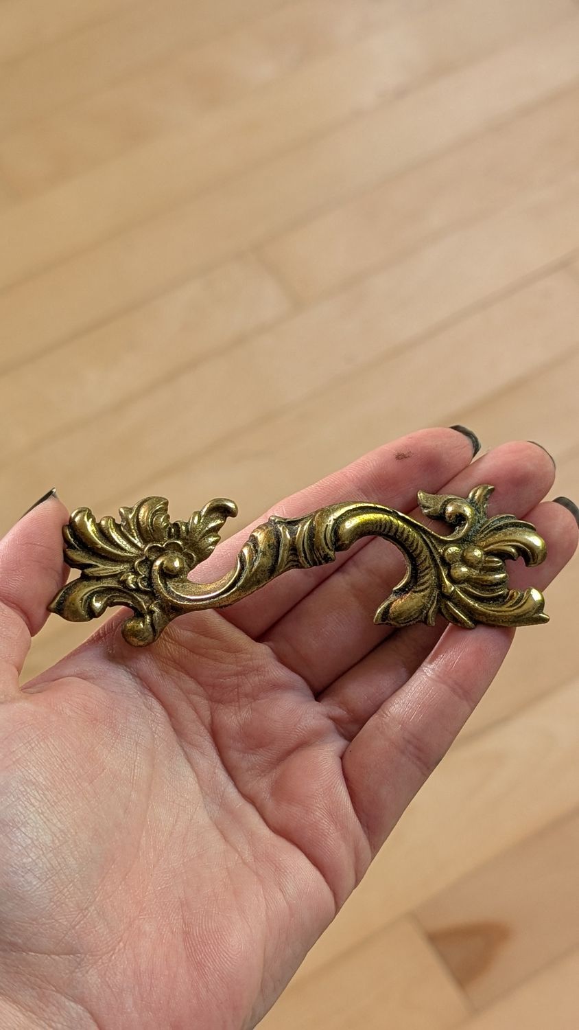 Ornate brass handles
