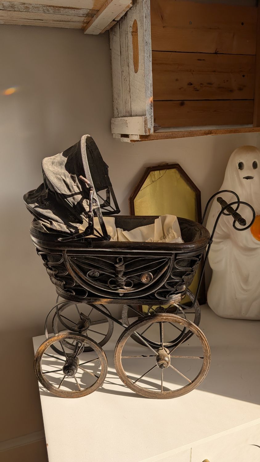 Antique wicker doll stroller