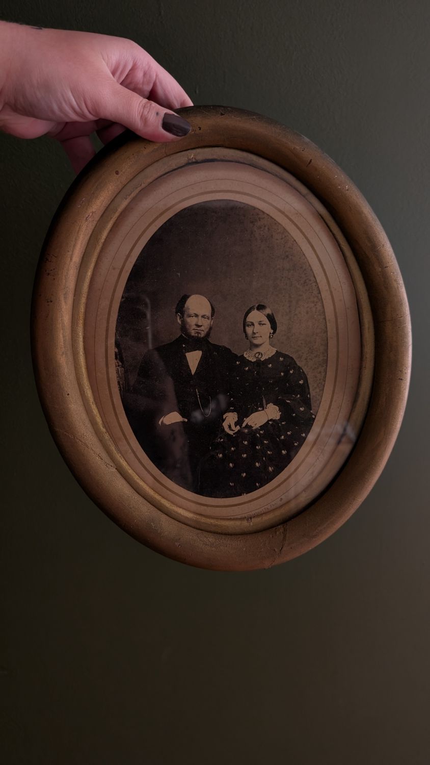 Victorian family portrait in wood frame