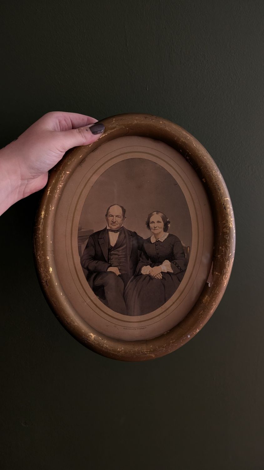 Victorian couple in wood frame