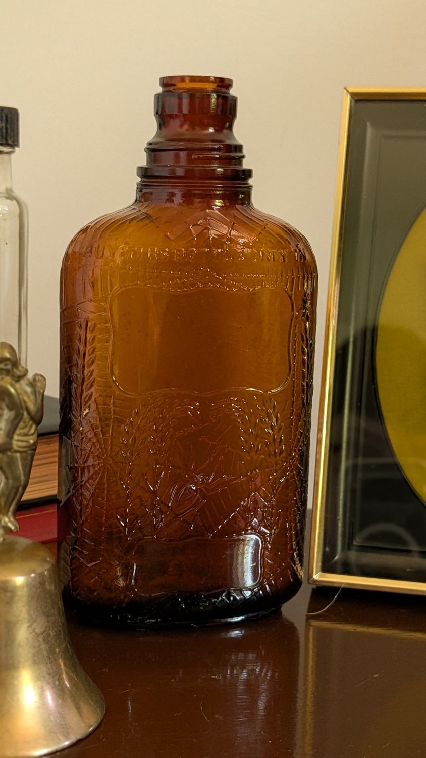 Small spider web whiskey bottle vintage